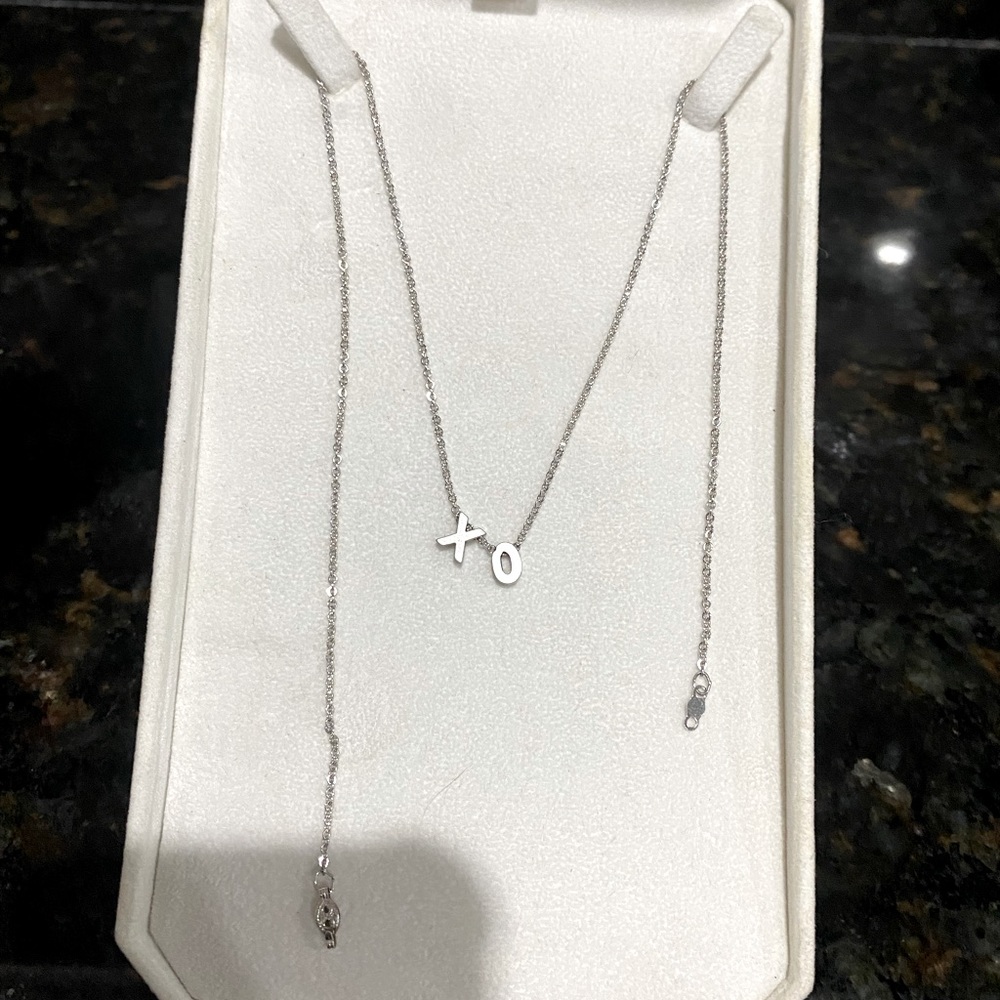 Silver XO charm necklace I put together for me and my friends